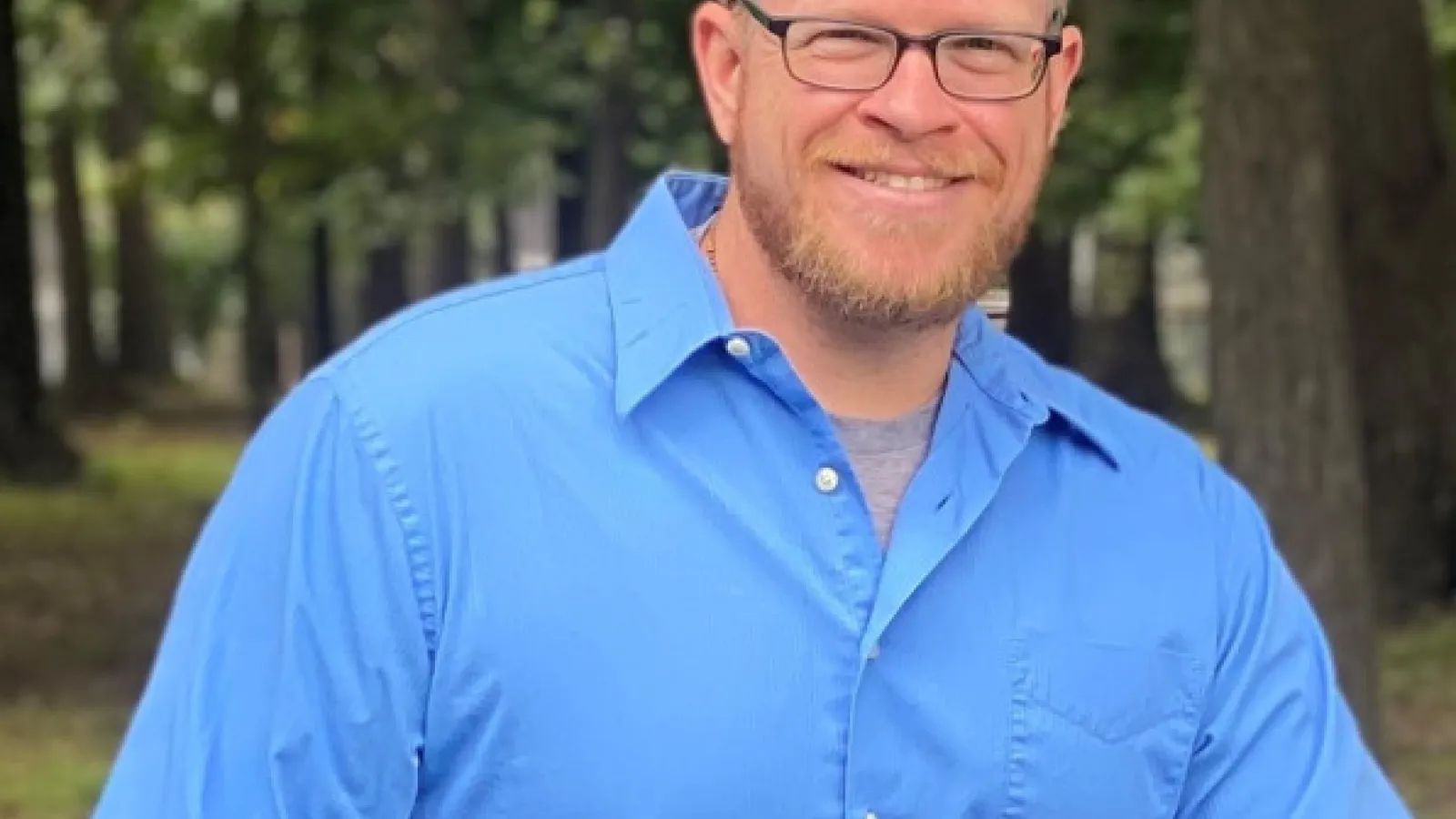 David Hibler in wooded area