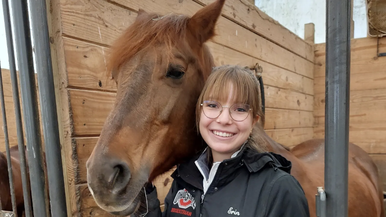 Murray with horse in stall