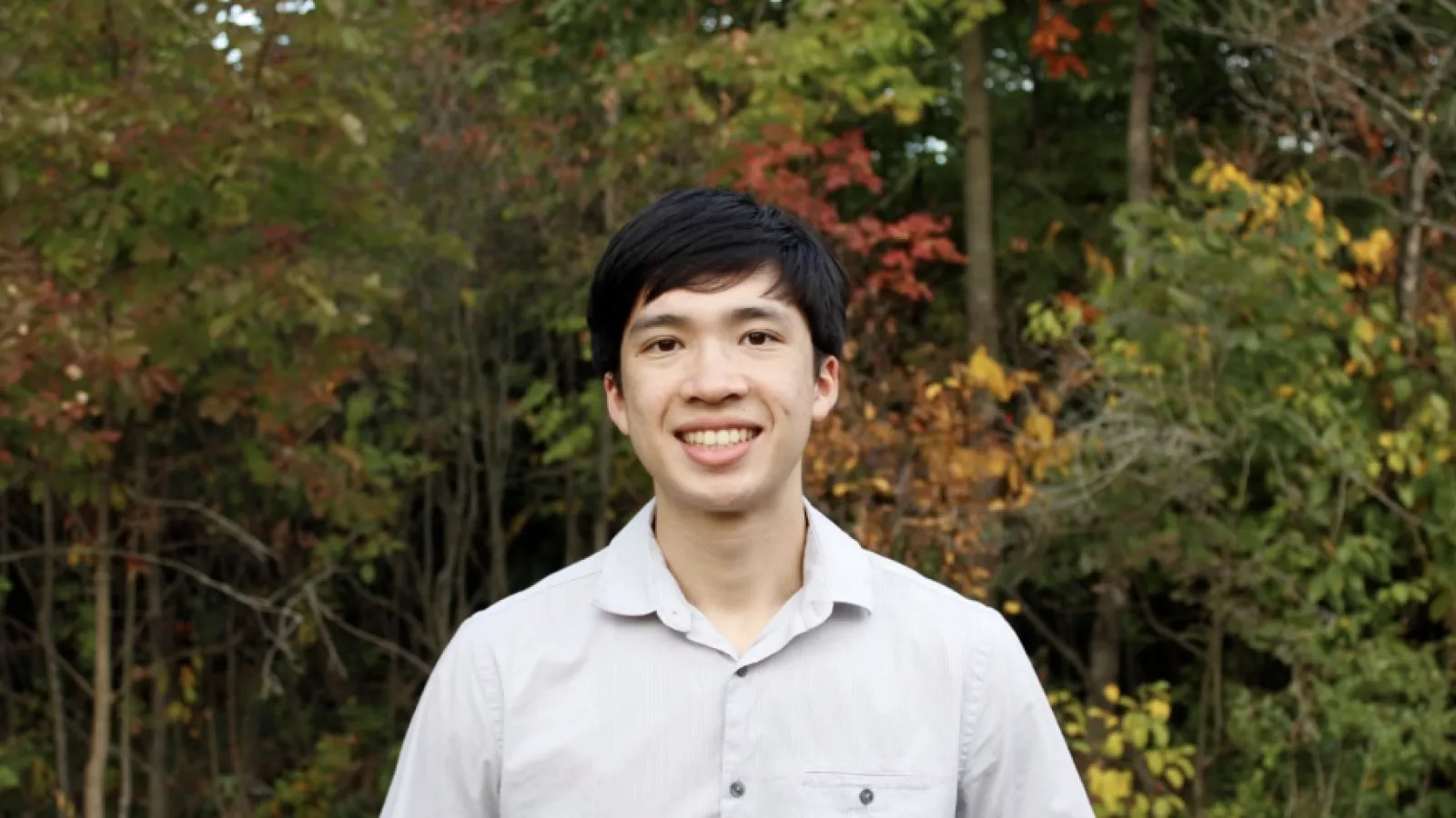 Richdara Sok in front of deciduous trees