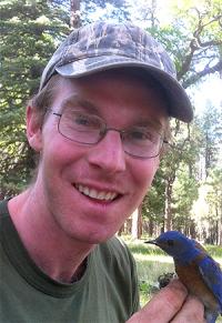 James Mouton holding bird