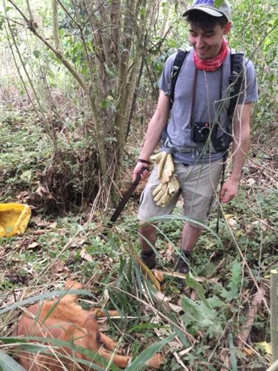 Nate Shoobs collecting snails