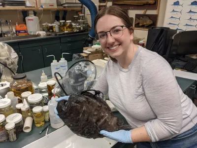 Liz Santos holding a footballfish