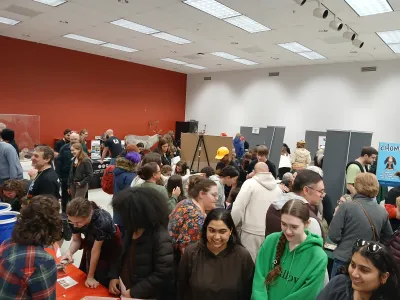 Open House attendees flood the MBD auditorium