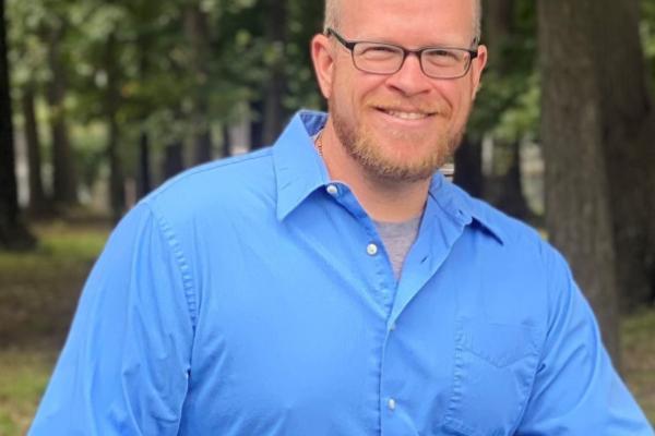 David Hibler in wooded area