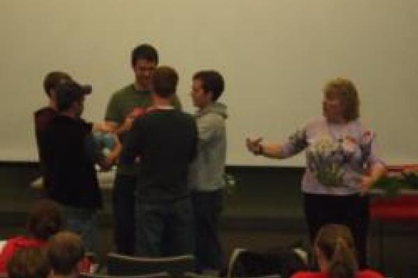 Cynthia Dassler instructs students at thefront of Jennings 001