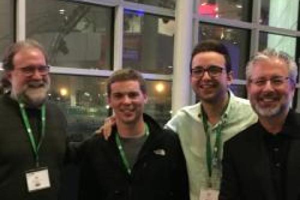 Adam Lehnig & Steven Nagel with Neil Shubin inside Clevelnd Ohio convention center