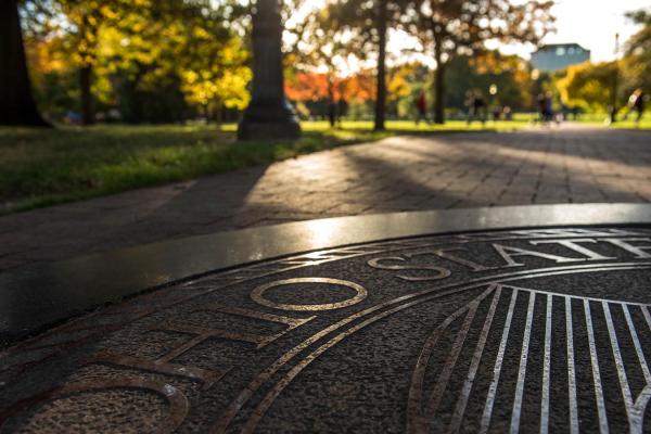 Ohio State seal inlay at east end of oval walkway